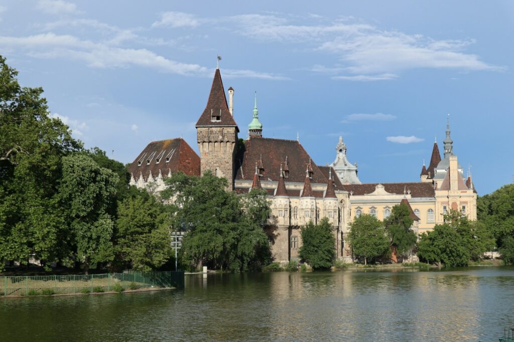 A large building sitting on top of a lake